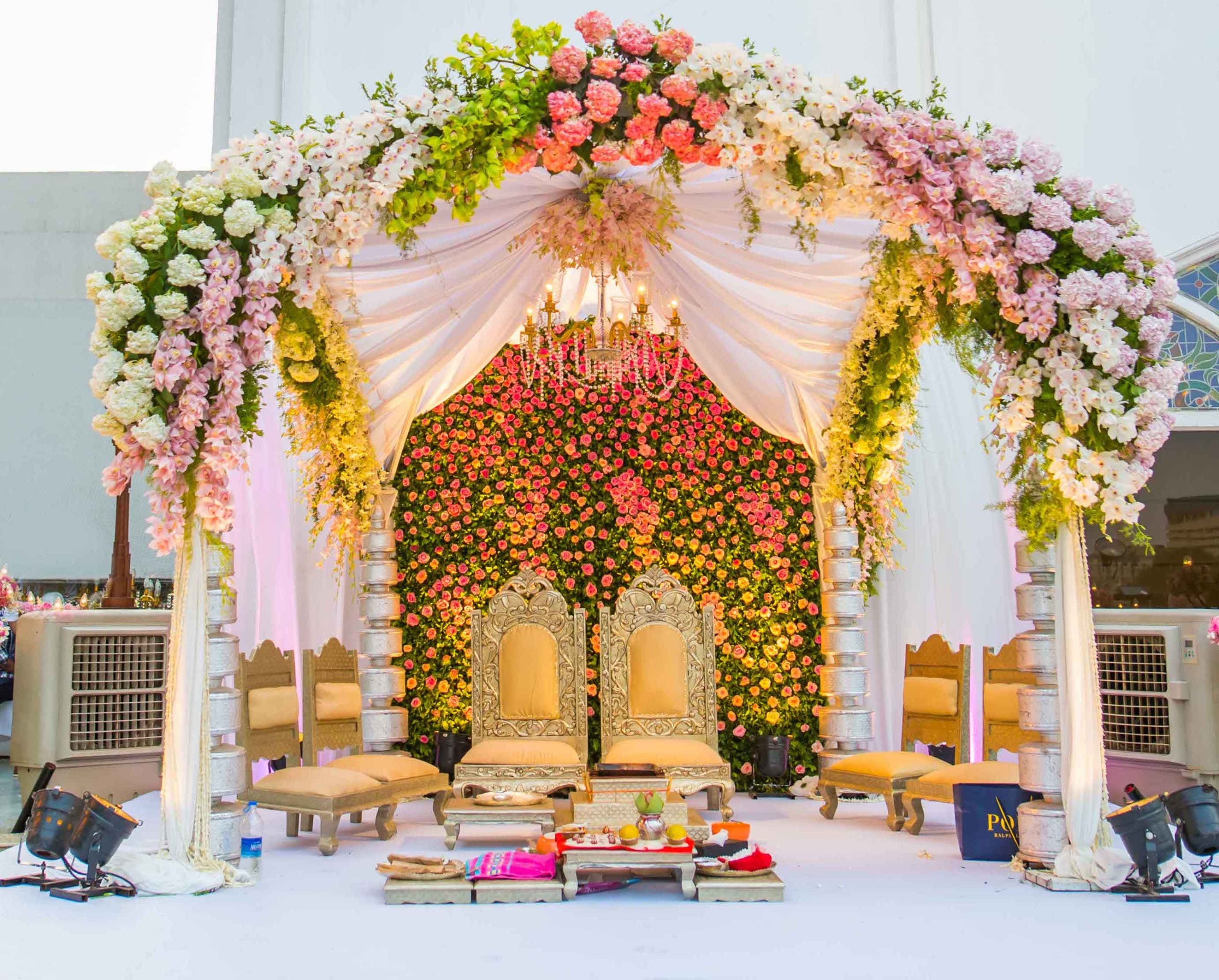 Ornate gold and white floral backdrop
